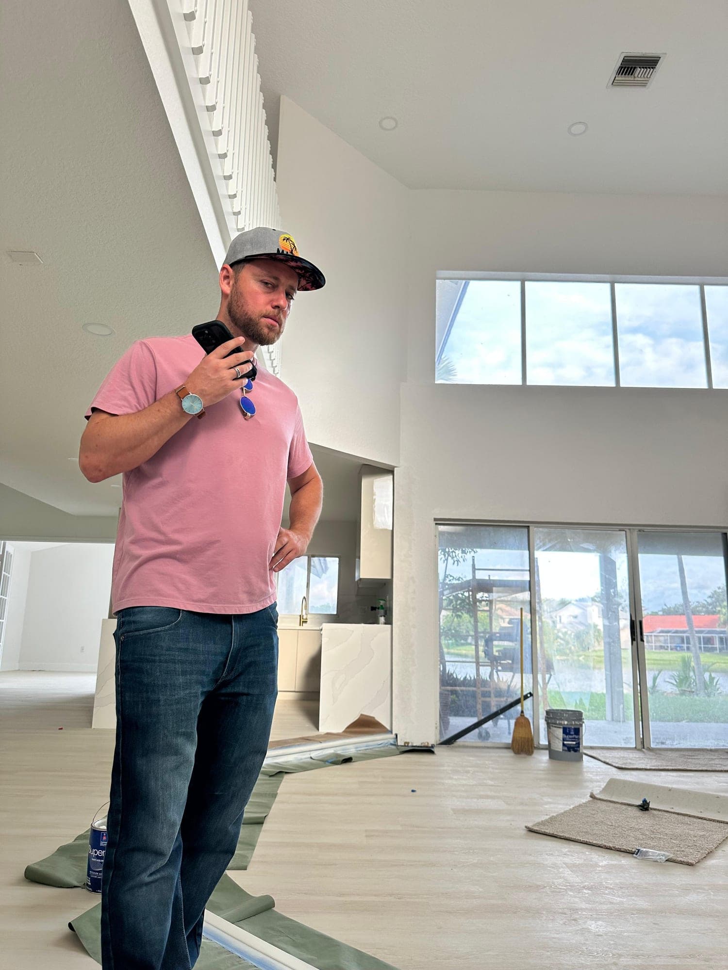Jonah Stevens walking through a bright property interior